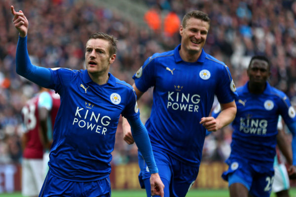 STRATFORD, ENGLAND - MARCH 18: Jamie Vardy of Leicester City (L) celebrates scoring his sides third goal with Robert Huth of Leicester City (R) during the Premier League match between West Ham United and Leicester City at London Stadium on March 18, 2017 in Stratford, England. (Photo by Steve Bardens/Getty Images)
