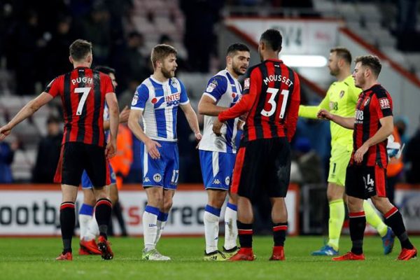 Soccer Football - FA Cup Third Round - AFC Bournemouth vs Wigan Athletic - Vitality Stadium, Bournemouth, Britain - January 6, 2018   Wigan Athletic’s Sam Sayed Morsy and Michael Jacobs shake hands with Bournemouth's Lys Mousset, Ryan Fraser and Marc Pugh after the match    REUTERS/Peter Nicholls